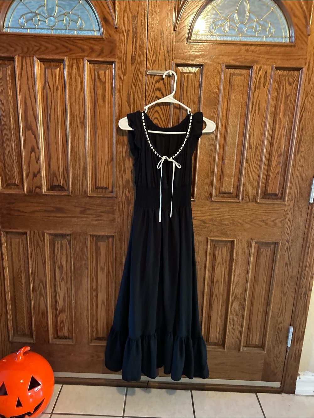 Sleeveless Black Maxi Dress with Pearl-Trim Neckline